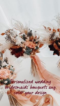 two wedding bouquets with pink flowers and feathers