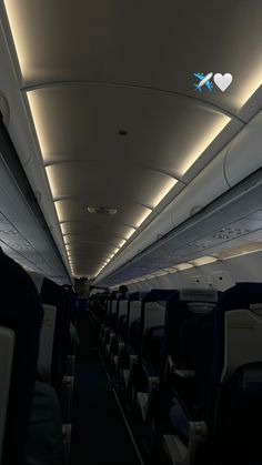 the inside of an airplane that is empty and has no people sitting on it or standing around