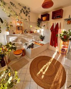 a bathroom with plants on the wall and a rug in the floor next to it