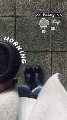 a person with their feet up on the ground next to a sign that says morning