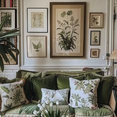 a living room filled with lots of green furniture