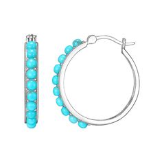 These platinum over sterling silver hoop earrings are adorned with bright simulated turquoise stones that'll put a smile on your face. These platinum over sterling silver hoop earrings are adorned with bright simulated turquoise stones that'll put a smile on your face. Nickel free Metal: sterling silver Backings: click-it Packaging: boxed Plating: platinum Finish: polished Diameter: 1 in.STONE DETAILS Stone type: simulated turquoise Total weight: 2 ct. Shape: round Gemstones may have been treate Nickel-free Turquoise Hoop Jewelry, Turquoise Sterling Silver Round Hoop Earrings, Turquoise Sterling Silver Hoop Earrings For Pierced Ears, Turquoise Sterling Silver Small Hoop Jewelry, Turquoise Pierced Hoop Earrings, Turquoise Hoop Jewelry, Turquoise Sterling Silver Nickel-free Hoop Earrings, Turquoise Sterling Silver Hoop Earrings, Turquoise Sterling Silver Small Hoop Earrings