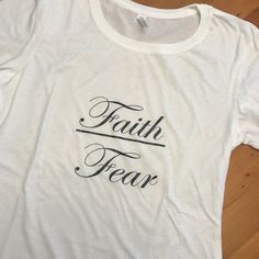 Faith Over Fear Tee Shirt Crewneck Short Sleeve 60% Cotton/40% Polyester Size Large Boutique Item/Nwt White Shirt With Text Print For Fall, Basic White Shirt For Fall, Faith Over Fear, White And Black, Colorful Shirts, Tee Shirts, Womens Tops, Tops & Tees, Black And White