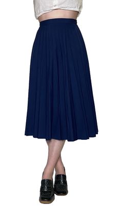 This navy pleated skirt is elegant and beautiful. The solid navy colour is easy to pair with anything: such as a tank bodysuit, a button-up shirt, or a classic band tee. Brand: Not Labelled Materials: 65% Polyester, 35% Viscose Condition: Excellent Measurements: Waist- 26.5", Hips- Free, Length- 28.5". Fitted Solid Color Flared Pleated Skirt, Stretch Solid Color Flared Pleated Skirt, Fitted Solid Pleated Skirt, Classic Pleated Summer Skirt, Fitted Full Pleated Skirt In Solid Color, Fitted Pleated Skirt With Accordion Pleats, Classic Summer Pleated Skirt, Classic Pleated Skirt For Summer, Fitted Solid Pleated Midi Skirt