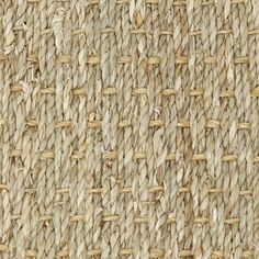 close up view of woven fabric textured with natural colors and pattern, beige color