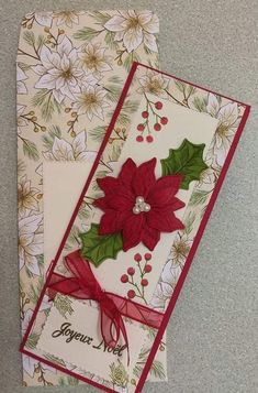 two christmas cards with holly and poinsettis on them, one has a red ribbon