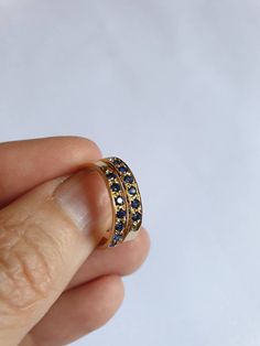 Blue Sapphire ring, gold Sapphire ring, Sapphire half eternity ring, stacking Sapphire ring, September birthstone ring, Sapphire 14k ring Handmade delicate Blue Sapphire, half eternity stacking ring, stoned with 7 beautiful sky blue Sapphire gemstones. This multistone eternity ring is beautiful alone or stacked together with other rings and is colorful and pretty on your finger. The ring is available in nickel free, 14 karat gold plating over a brass or silver base. It is also offered in solid s Sapphire Stackable Birthstone Ring In 14k Gold, Yellow Gold Sapphire Stackable Ring For Anniversary, Dainty Stackable Sapphire Ring For Anniversary, Yellow Gold Eternity Band With Birthstone For Promise, Stackable Open Sapphire Ring For Anniversary, Promise Ring Eternity Band With Birthstone In Yellow Gold, Anniversary Stackable Sapphire Open Ring, Anniversary Stackable Open Sapphire Ring, Gold Sapphire Eternity Band As Gift