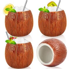 three orange tiki cups with straws and lemon slices