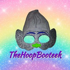 a silver mask with the words the hoopbooteek on it's face