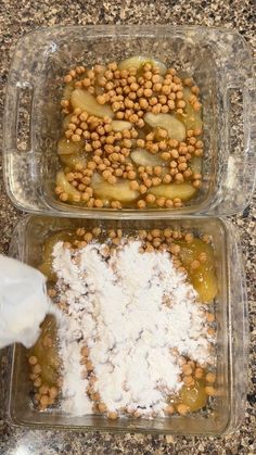 two plastic containers filled with food on top of a counter