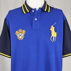 Brand New With Tags! Smoke And Pet Free Home Polo By Ralph Lauren Classic Fit Shirt Short Sleeves With Ribbed Arm Royal Blue With Dark Green And Navy Trim Around Sleeves, Embroidered Metallic Gold Big Pony And Emblem Ribbed Polo Collar. Two-Button Placket. Tennis Tail. Men’s Size Medium 100% Cotton Thanks For Checking It Out! ***I Ship Every Single Business Day!*** Blue Polo Shirt With Collar And Buttons, Blue Polo Collar Top With Buttons, Fitted Blue Button-up Polo Shirt, Navy Polo Collar Top With Buttons, Blue Short Sleeve Polo Shirt For Workwear, Blue Short Sleeve Polo Shirt For Work, Classic Blue Button-up Polo Shirt, Classic Blue Polo Shirt With Buttons, Blue Polo Collar Shirt For Work