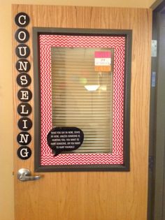 an office door decorated with pink and black letters that spell out the word coaching on it