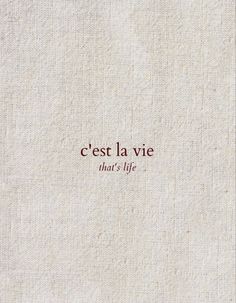 the words cest la vie that's life written in red ink on a white background