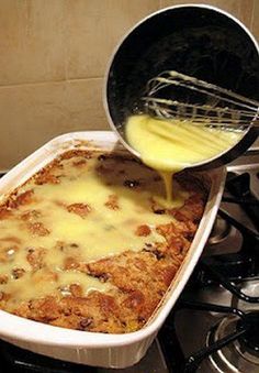 a pan filled with food sitting on top of a stove next to a burner