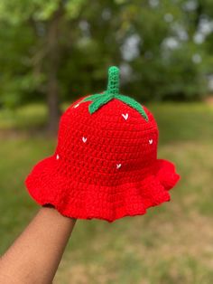 Red strawberry hat with a green stem and white heart shaped seeds! Red Crochet Wide Brim Hat, Red Wide Brim Crochet Hat, Playful Red Bucket Hat, Red Wide Brim Crochet Hat For Spring, Adjustable Brimmed Red Crochet Hat, Red Crochet Hat With Adjustable Short Brim, Red Brimmed Crochet Hat Made Of Yarn, Casual Red Brimmed Mini Hats, Red Adjustable Crochet Bucket Hat