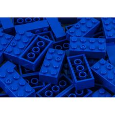 a pile of blue legos sitting next to each other