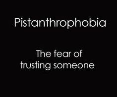 a black background with white text that reads, the fear of trusting someone