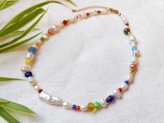 Colorful freshwater pearl necklace is quirky and cute. In this beautiful beaded necklace, I have paired freshwater pearls in different colors, shapes and sizes, with all kinds of colorful glass beads.  14k gold plated / stainless steel. The beading wire I use is high-quality stainless steel, composed of multiple twisted tiny wires that are nylon coated to protect the beads. The length of the necklace is 15 inches (38 cm), with a 2 inches (5 cm) extension chain - so you can adjust the length of y Trendy Multicolor Pearl Necklace For Gift, Trendy Multicolor Pearl Necklace Gift, Trendy Multicolor Pearl Necklace, Trendy Pearl Necklace With Colorful Beads For Gift, Beautiful Beaded Necklaces, Calm Waters, Freshwater Pearl Necklace, Beading Wire, Colourful Necklace