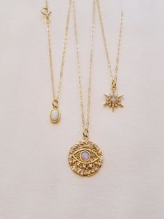 "Opal Necklace, Gifts for Her, Dainty necklace, Opal Jewelry, Necklaces for Her, Minimalist, Opal, Minimalist Jewelry, Dainty Jewelry A perfect dainty necklace for her! ★ Details: ~Opal Pendant Options: Drop, NorthStar, Evil Eye, Oval, Round ~The chain is made up of 14 K gold filled material with spring clasp. ~ Available in various lengths. ~Comes elegantly in a cute package, ready to give. ★How to Order: ~Please select your desired length and pendant under \" SELECT AN OPTION\". ★Enter Azram D White Celestial Necklace With Adjustable Chain, White Celestial Clavicle Chain Jewelry, Celestial White Necklace With Adjustable Chain, Celestial White Clavicle Chain Jewelry, Celestial Style White Clavicle Chain Jewelry, White Celestial Choker Jewelry, Celestial Necklace With Delicate Chain, White Bohemian Jewelry With Delicate Chain, Bohemian White Chain Necklace As A Gift