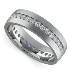 a white gold wedding ring with channeled diamonds