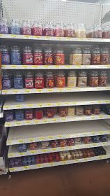 the shelves are filled with many different types of spices and condiments for sale