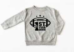 Perfect 1st Birthday Shirt for your little football fan! THE DEETS + SOFT COTTON/POLY + Lightweight Pullover + TRUE TO SIZE! If in between size up + TRUCKER HAT is an adjustable toddler snapback. Fits ages 1-5 + FAST SHIPPING Thank you so much for looking at this adorable 1st birthday tee! Football First Birthday, Birthday Sweatshirt, 1st Birthday Shirts, First Birthday Shirts, Birthday Tee, Sweatshirt Outfit, First Birthday Outfits, Top Baby Products, Gender Neutral Baby Clothes