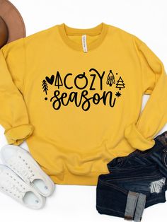 Collect yourself in the most fashionable way possible this season! Nothing says bring on Fall and Winter like fun graphic sweatshirts! Pair this with your favorite high waisted jeans and booties for a Fall worthy look! Details: Sizing: Small (4/6) | Medium (8/10) | Large (12/14) | XL (14/16) Tickled Teal brand sweatshirts comparable to Gildan 18000 fit. PROCESSING TIME: 5-7 business days **NOTE** If ordered with non-custom items, order will be held to ship with graphic tees. Cute Yellow Sweatshirt For Fall, Trendy Yellow Fall Sweatshirt, Trendy Yellow Sweatshirt For Fall, Trendy Graphic Print Winter T-shirt, Trendy Winter Tops With Comfortable Fit, Trendy Comfortable Winter Tops, Trendy Comfortable Fit Tops For Winter, Fun Cotton Sweatshirt For Winter, Trendy Graphic Print Sweatshirt For Winter