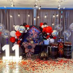 a birthday party with balloons and decorations