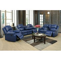 a living room filled with blue leather furniture