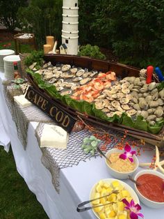 a buffet table filled with different types of food