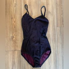 Size Xs Purple One-piece Bodysuit With Lined Body, Purple One-piece Lined Bodysuit, Black Dancewear Leotard With Lined Body, Black Lined Dancewear Bodysuit, Black Dancewear Bodysuit With Lined Body, Purple One-piece Bodysuit For Party, Purple Lined Stretch Bodysuit, Stretch Purple Bodysuit With Lined Body, Fitted Purple Bodysuit With Lined Body