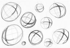 several different shapes and sizes of balls drawn in pencil on a sheet of white paper