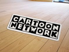 a floor mat that says cartoon network on it