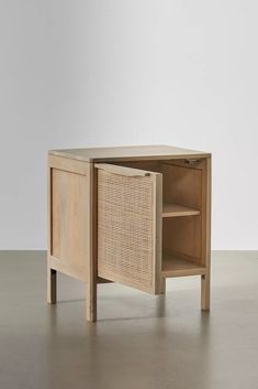 the sideboard is made out of wood and has a rattan pattern on it