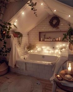 a bathroom with lights on the ceiling and a jacuzzi tub