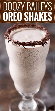 boozy bailey's oreo shakes in a glass with chocolate sprinkles