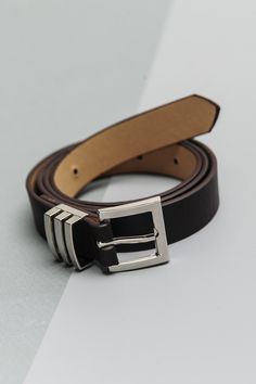 Pull things together in this classic belt featuring gold hardware with ring details on the side. Square buckle. Artisan crafted from fine leathers and premium materials.DETAILS:material: 70% pu leather + 30% alloyfully Adjustablebuckle width: belt width length: 41"one size Modern Leather Belt With Metal Pin Buckle, Luxury Formal Belt With Metal Pin Buckle, Elegant Leather Belt With Metal Pin Buckle, Gorjana Jewelry, Classic Belt, Sunglass Chain, Faux Leather Belts, Unique Ring, Steel Necklace