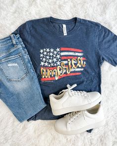 Make a statement in our American Flag Graphic Tee! This stylish Bella Canvas brand tee is true to size and features a bold American flag design. Whether you're headed to a game, the beach, or a party, add a patriotic touch with this bold and confident statement piece. Material: Poly/Cotton Blend American Flag Design, Flag Design, American Flag, Statement Pieces, Bella Canvas, Graphic Tee, The Beach, Graphic Tees, Cotton Blend