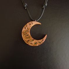 My guarantee to you is that all of the Jewellery you see in my shop is handmade by me and not purchased from any third party's ★DESCRIPTION★ Crescent Moon Necklace With Rainbow & Cosmic Lab Grown Opal Inlay. (please choose rainbow from the drop down menu) Made From Oak Burr/Burl Wood.  There are 2 styles for the moon, please leave a note if you want the other style in photo 3 and 4 There is a choice to have gemstone or lab grown opal. For natural Ethiopian Opal inlay, please message me for price Handmade Celestial Half Moon Necklaces, Handmade Celestial Half Moon Necklace, Handmade Moon Shaped Nature-inspired Necklace, Handmade Bohemian Half Moon Necklace, Handmade Moon-shaped Artistic Jewelry, Handmade Moon-shaped Spiritual Necklace, Handmade Moon Shaped Artistic Jewelry, Handmade Moon Shape Spiritual Necklace, Handmade Artistic Moon-shaped Jewelry