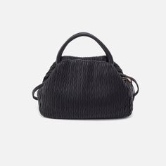 Our most darling bag, the Darling is designed to be a casualcool top handle with a removable crossbody strap for handsfree days and nights. Darling Satchel In Soft Pleated Leather  Black SATCHEL Bag in Black | Hobo® Evening Crossbody Hobo Bag With Top Carry Handle, Black Bucket Bag With Handle Drop For Evening, Black Bucket Bag With Detachable Strap And Double Handle, Black Crossbody Hobo Bag For Evening, Black Shoulder Bag With Handle Drop For Evening, Modern Black Satchel With Detachable Handle, Black Bucket Bag With Detachable Top Handle, Chic Shoulder Bag With Adjustable Round Handle, Modern Black Top Handle Satchel