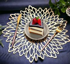 a piece of cake sitting on top of a plate next to a fork and knife