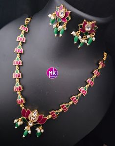 Vibrant color Lotus Meenakari work trendy Necklace with matching Earrings - Fashion Jewelry - Mk Fashionkart Earrings: Matching Earrings Material: Gold finish, Meenakari work Suitable for Saree/Salwar/party wear dresses Adjustable length    SHIPPING : Ready to ship in 1 business day. This item will be shipped from The United States. Jewelry care instructions : 1. Please wipe the jewelry with a piece of cotton cloth after usage.  2. Store the jewelry in a cool, dry and air tight box or pouch.  3. Make sure the jewelry is away from direct heat and water. 4. Please wipe of any moisture, sweat, soap water after usage. Elegant Multicolor Sets With Latkans, Multicolor Meenakari Temple Jewelry Sets, Multicolor Kundan Necklace With Matching Earrings For Celebration, Multicolor Kundan Necklace With Matching Earrings For Festive Occasions, Multicolor Kundan Necklace With Motifs As Gift, Multicolor Sets With Latkans For Gifts, Multicolor Cutdana Sets As Gift, Multicolor Cutdana Sets For Gift, Multicolor Temple Jewelry Sets As Gift