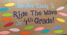 a sign that says we are ready to ride the wave on 4th grade with colorful leaves