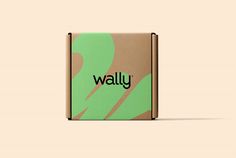 a box with the word'wally'printed on it, sitting in front of a beige background