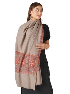 Indulge in luxurious comfort with our Soft Pashmina Shawl, crafted from pure Kashmiri pashmina in the serene Natural Toosh shade. This shawl is not just an accessory; it's a statement of elegance and sophistication. Product Details: Hand Embroidered Pure Kashmiri Pashmina Shawl Material: Pure Pashmina (100% Cashmere) Size: 100 cm X 203 cm / 40 Inch X 80 Inch / 1.1 x 2.2 Yards (Approx) Base Color: Natural Toosh Sourced From: Changthangi goats in the Himalayan region of Ladakh Origin: Crafted in K Elegant Handloom Pashmina Shawl, Beige Pashmina Shawl In Traditional Drape, Pashmina Dupatta, Kashmiri Pashmina Shawl, Pashmina Shawl, Himalayan, Base Colour, Hand Embroidered, Goats