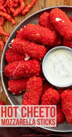 a plate full of fried mozzarella sticks with dip