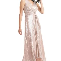 Katrina Sequin High-Low Gown Champagne Wishes Come True In This Gracefully Draped Gown, Dripping In Effervescent Sequins And Finished To Flow With A High-Low Hem. Pre-draped Evening Dress For Prom Season, Sequin Bridesmaid Gown For Party Season, Bridesmaid Gown With Sequins For Party Season, Fitted Sequin Maxi Dress For Bridesmaids, Floor-length Pre-draped Party Dress, Pre-draped Floor-length Party Dress, Sleeveless Champagne Mother Of The Bride Dress For Party, Pre-draped Sleeveless Evening Dress For Party, Floor-length Sequin Bridesmaid Dress