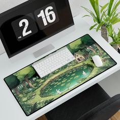 a computer desk with a keyboard and mouse on it, next to a clock showing the time