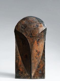 an old, rusted metal object on a white background