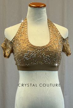 Bronze halter top is covered with Tan lace. Short off shoulder sleeves are attached. This is a top only and trunks are not included. 4 Gross of Light Colorado Topaz AB Rhinestones! Custom made by The Line Up! *Please note, this top has some lace elastic fraying that would not be noticeable on stage. **Costume in image is an AS, Photographed on an AS/AM Mannequin with Measurements of: Bust 35", Ribcage 30", Waist 25", Hip 34", Girth 57" Trio Costumes, Sequin Jewelry, Off Shoulder Sleeves, Costumes Couture, Cold Shoulder Sleeves, Sequin Appliques, Tutu Costumes, Group Costumes, Rhinestone Appliques